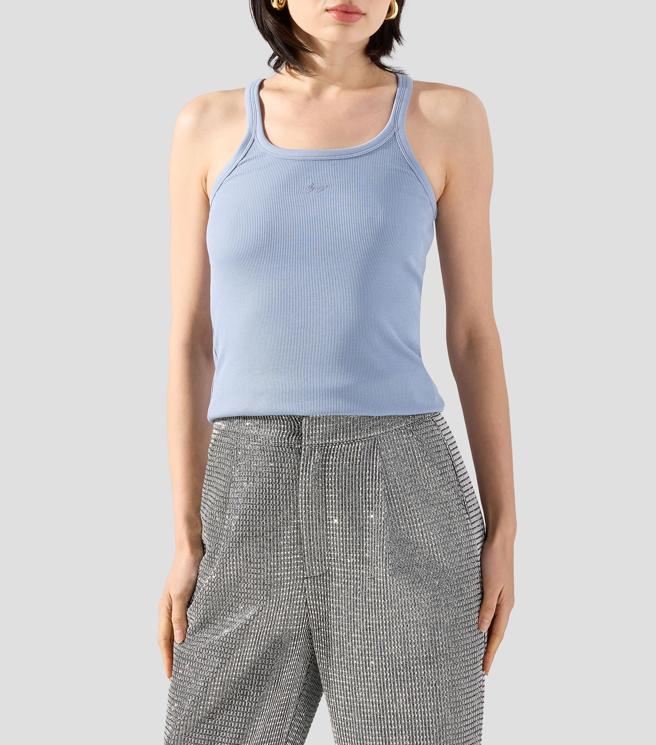 Blusa lisa sin mangas Mujer